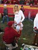 lucky-sidelines-guy-gives-first-aid-to-a-leggy-blonde-cheerleader.jpg