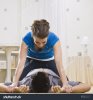 stock-photo-attractive-couple-wrestling-with-woman-on-top-of-the-man-square-composition-32927107.jpg