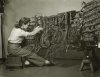 A photo of an engineer wiring an early IBM computer 1958 by Berenice Abbott.jpg