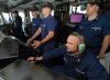Crew_members_of_the_Coast_Guard_Cutter_Bear_(WMEC-901)_stands_watch_on_the_bridge.jpg