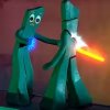 Gumby-and-Evil-Clone-Robot-Gumby-lightsaber-fight-in-the-1995-film-Gumby.jpg